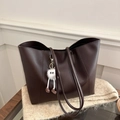 Minimalist deep brown leather tote bag with stylish white plush monster charm accessory - With Pendant / Brown