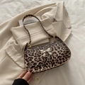 Leopard print baguette shoulder bag featuring a silver metal bow accent for women - Leopard Khaki