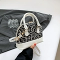Elegant white shell bag with grey leopard print and gold hardware details - White