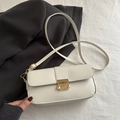Chic cream white rectangle crossbody bag with gold hardware buckle and leather strap - White