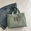 Sage green nylon tote bag with dual zipper pockets and reinforced shoulder straps - Green