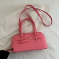Barbie pink PU leather Boston bag with round handles and adjustable gold buckle strap - Pink