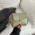 Elegant sage green semi-circular leather crossbody bag with gold zipper and strap - Green
