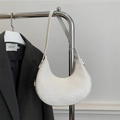 Chic white croc-embossed half-moon underarm bag paired with a gray blazer outfit - White