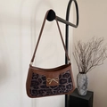 Schicke Schultertasche mit Leopardenmuster, braunem Besatz und goldener Schleife - Leopard Schwarz
