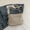 Minimalist beige nylon crossbody bag with clover logo and adjustable wide strap - Khaki