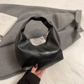Elegante borsa a mano a mezzaluna in finta pelle nera con design patchwork da donna trendy - Nero