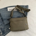 Minimalist army green nylon square crossbody bag with clover logo and adjustable strap - Green