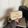 Beige leather mini bag with THE MINI BAG text and geometric pattern wide strap - Khaki