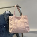 Roze corduroy draagtas voor dames met een minimalistisch ontwerp en grote inhoud - Roze