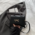 Classic black leather bow small square bag with elegant gold metal buckle and strap - Black