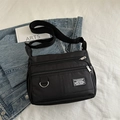 Sac bandoulière en nylon noir avec poches zippées et sangle réglable pour femmes - Noir