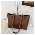 Detail showing high-quality brown PU leather tote with stylish white contrast stitching - Dark Brown