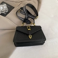 Black woven leather crossbody bag with chic geometric pattern wide strap and gold buckle - Black