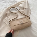 Minimalist beige crescent underarm bag in premium faux leather with silver buckle detail - Khaki