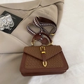 Brown leather crossbody bag with woven flap detail and stylish geometric wide strap - Brown