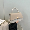Beige crossbody bag with textured woven flap and elegant gold-tone square lock - Khaki