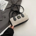 Mini borsa Boston in tela beige con finiture in pelle nera e tracolla regolabile - Nero