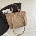 Light brown corduroy tote bag with golden sunburst buckle and leather shoulder straps - Khaki