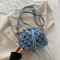 Blue denim checkered bucket bag with distressed fringe texture and drawstring closure - Checkered Blue
