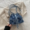 Blue denim bucket bag with star print, fringe details and drawstring closure - Star - Blue