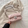 Light pink quilted leather shoulder bag with gold chain strap and metal swivel lock - Pink