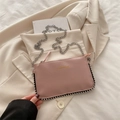Pink faux leather crossbody bag with FASHION lettering and silver chain strap - Pink