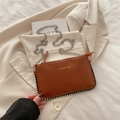 Minimalist caramel brown crossbody bag with silver rivets and metallic chain strap - Brown