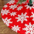 Classic red plush Christmas tree skirt with large white snowflake patterns on wood floor - 90cm / Red