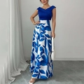 Elegante vintage bloemen maxi-jurk met diepblauwe V-hals lijfje en bedrukte A-lijn rok - S / Blauw en Wit Patchwork