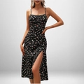 Détail de la fente latérale haute et du motif floral sur une robe midi noire - 3XL / Haut Et Bas / Noir Imprimé