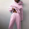 Women's pink two-piece tracksuit featuring an oversized hoodie and matching joggers - 3XL / Top And Bottom / Pink
