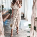 Detail of elegant champagne satin V-neck dress with waist tie and front buttons - S / Champagne