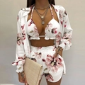 Gros plan sur l'ensemble de plage trois pièces avec imprimé floral rose sur tissu blanc - 3XL / Imprimé Floral Blanc