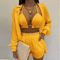 Dettaglio del set da spiaggia giallo tre pezzi con top a fascia, pantaloncini e camicia - Giallo