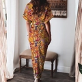 Détail du dos en V d'une robe longue bohème aux motifs géométriques vibrants - 3XL / Imprimé Cœur Orange