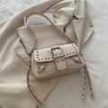 Chic cream-colored Y2K crossbody bag with silver rivet studs and decorative buckles - Off White