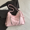 Bolso hobo rosa con lazo y cremalleras metálicas verticales en cuero suave - Rosa