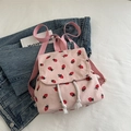 Pink corduroy mini backpack with strawberry pattern and drawstring fringe detail - Pink