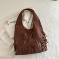 Chique bruine schoudertas met franjes van leer met lychee-patroon en boho-kwastjes - Bruin