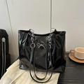 Black oily leather tote bag with silver bow detail and chain shoulder strap - No Pendant / Black