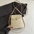 Beige straw woven crossbody bag featuring pink floral embroidery and gold metal clasp - Khaki