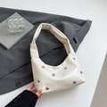 White faux leather hobo bag with silver rivets and wide shoulder strap for women - White