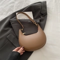 Brown half-moon underarm bag in lychee pattern leather with golden hardware - Brown