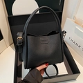 Black pebbled leather bucket bag with top handles and adjustable shoulder strap - No Pendant / Black