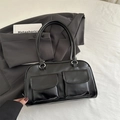 Bolso tote de cuero sintético negro con bolsillos delanteros dobles y herrajes plateados - Negro