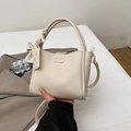Beige lychee leather bucket bag with silk scarf handle and golden hardware - With Pendant / White