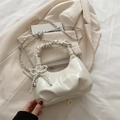 Chic cream white pleated baguette bag with bow detail and silver chain strap - With Pendant / White