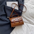 Vintage brown leather crossbody bag with dual buckles and polished gold hardware - Brown