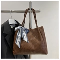 Detail of woven texture on brown tote bag with decorative Paris print silk scarf - Coffee